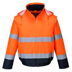 Orange two in one essential hi vis contrast jacket. Jacket has navy contrast on the bottom of the jacket and arms and visible hood.