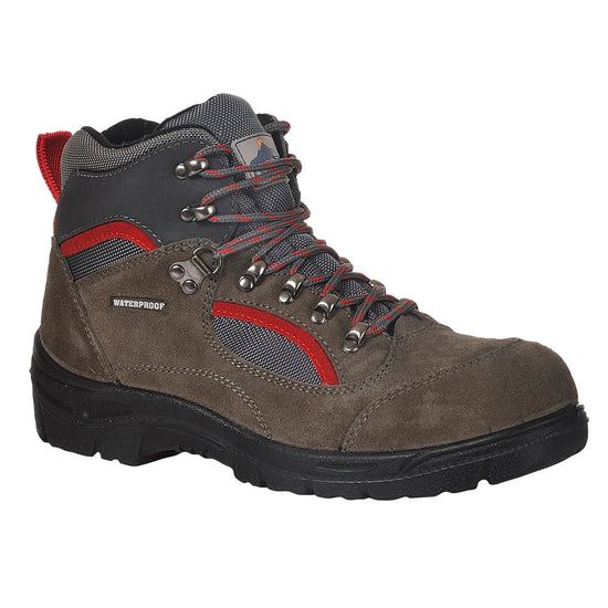 Brown Portwest Steelite All Weather Safety Hiker Boot. Boot has a black sole. Protective toe and Grey and red contrast on the tounge and boot upper. Boot also has Grey and red laces.