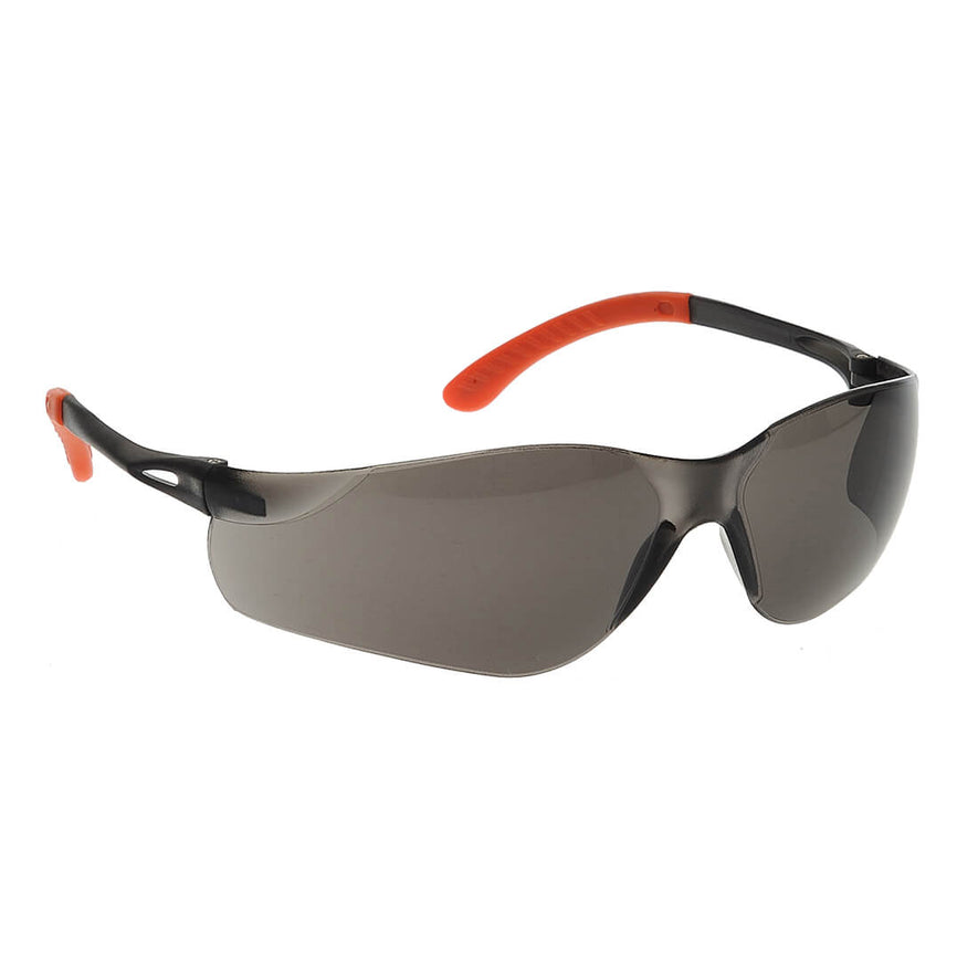 Smoke portwest pan view safety spectacles. Spectacles have black and orange arms, black nose padding as well as smoke lenses.