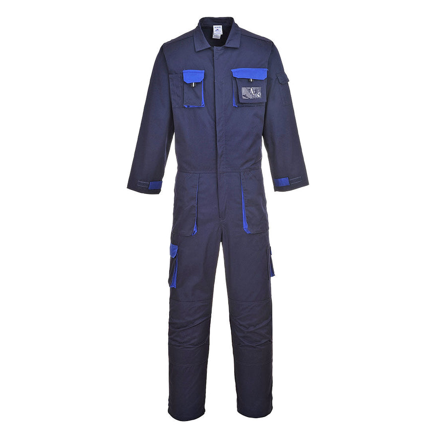 Navy portwest Texo coverall, Coverall has pockets on the sides, legs and chest. Chest pocket on the left has a ID badge holder. Coverall has royal blue contrast on the pocket outer.