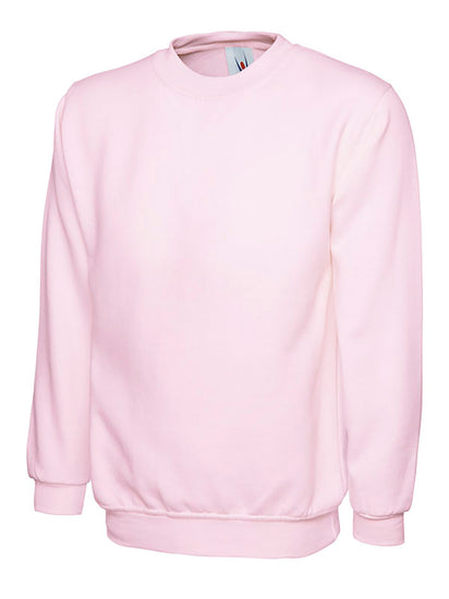 Uneek Clothing UX7 The UX Children's Sweatshirt in pink with long sleeves, crew neck and elasticated wrists and bottom.