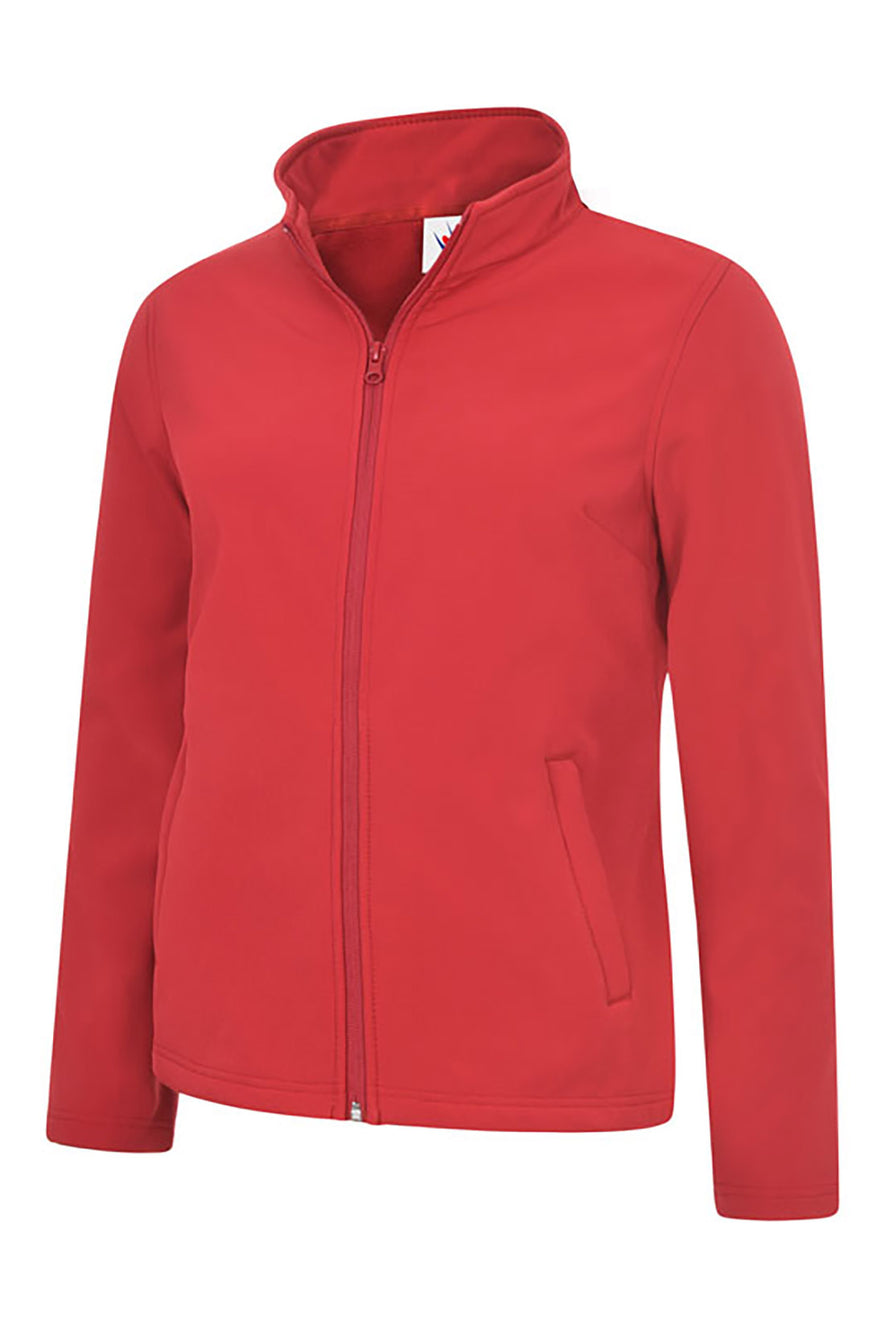 Uneek Clothing UC613 Ladies Classic Soft Shell Jacket in red with full zip fastening and two lower front pockets.