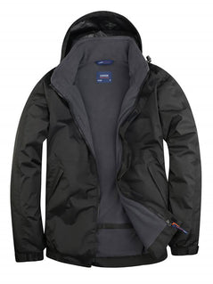 Uneek Clothing UC620 - Premium Outdoor Jacket in black with hood with grey fleece lining, full front zip and flap with velcro, two front lower pockets with flap concealed zip.