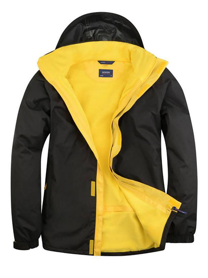 Uneek Clothing UC621 - Deluxe Outdoor Jacket in black with hood with yellow fleece lining, full front zip and flap with velcro.