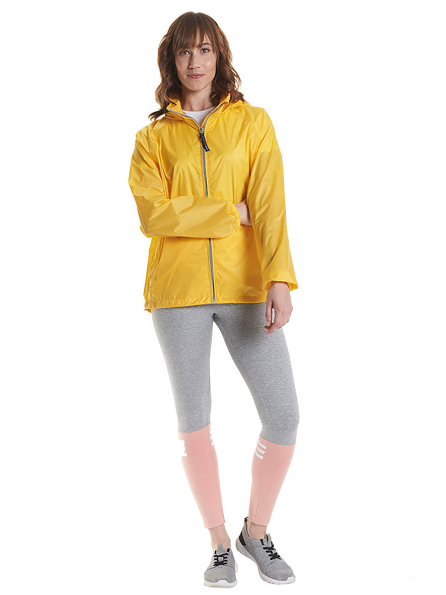 Person wearing Uneek Clothing UC630 Active Jacket lightweight in submarine yellow with grey full zip fastening and two lower zip pockets and hood.