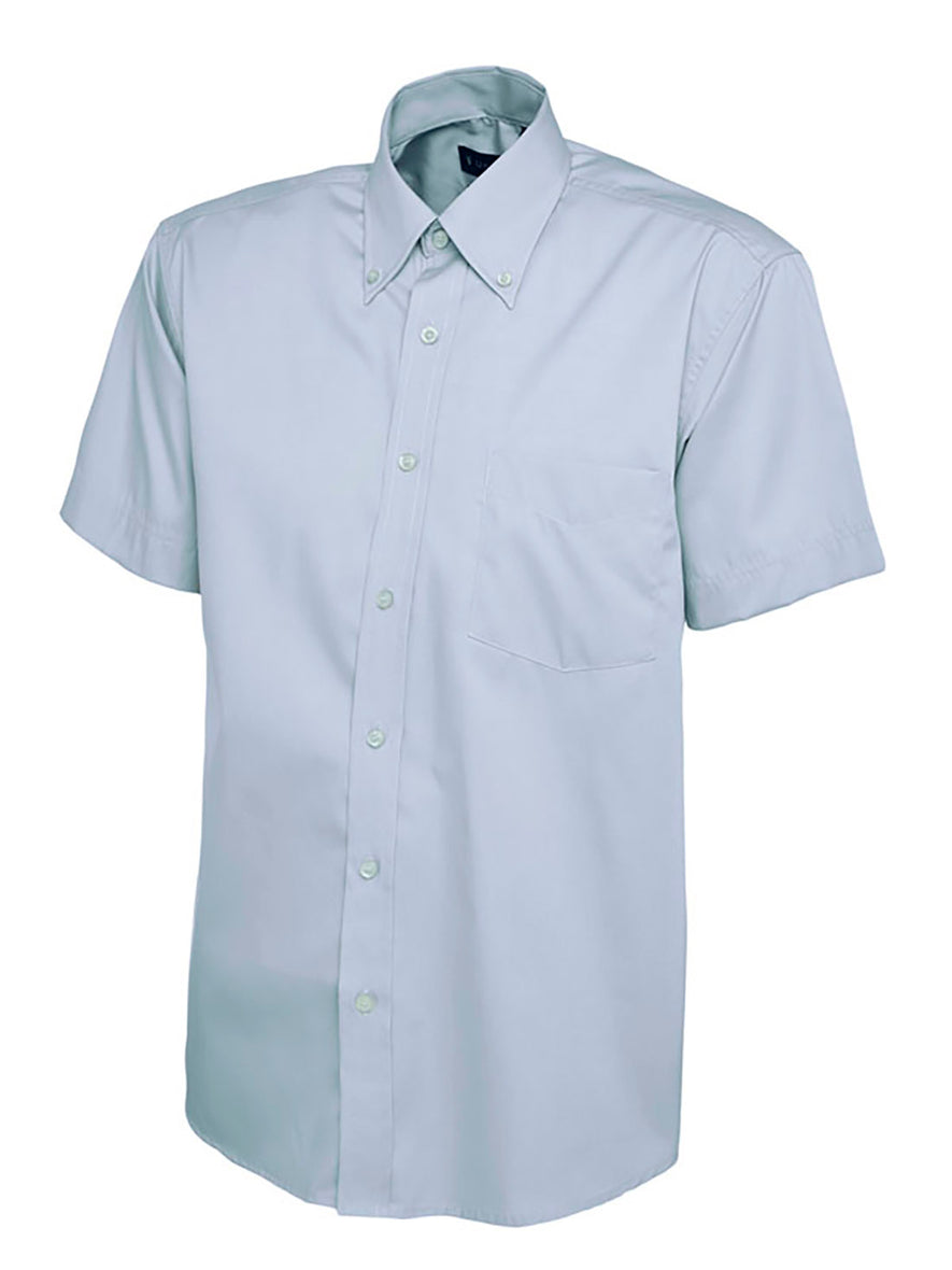 Uneek Clothing UC702 Mens Pinpoint Oxford Half Sleeve Shirt in light blue with light blue buttons, pocket on left chest and collar with light blue buttons.