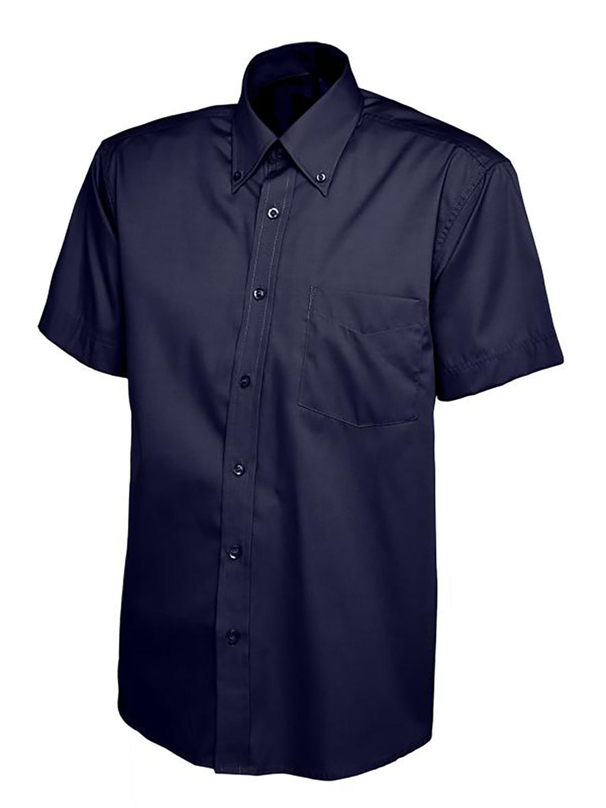 Uneek Clothing UC702 Mens Pinpoint Oxford Half Sleeve Shirt in navy with navy buttons, pocket on left chest and collar with navy buttons.