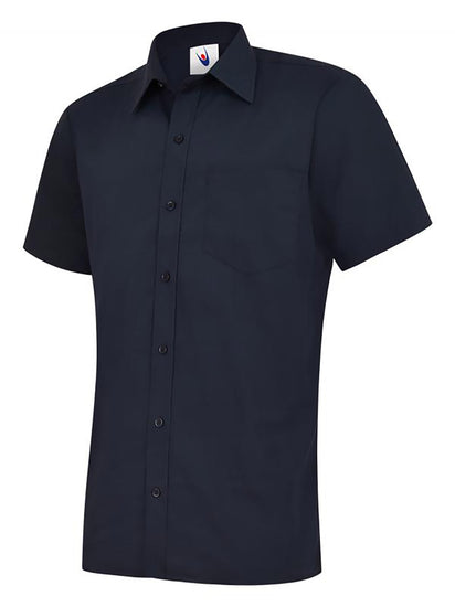 Uneek Clothing UC710 Mens Poplin Half Short Sleeve Shirt in navy with collar, pocket on left chest and navy buttons down front.