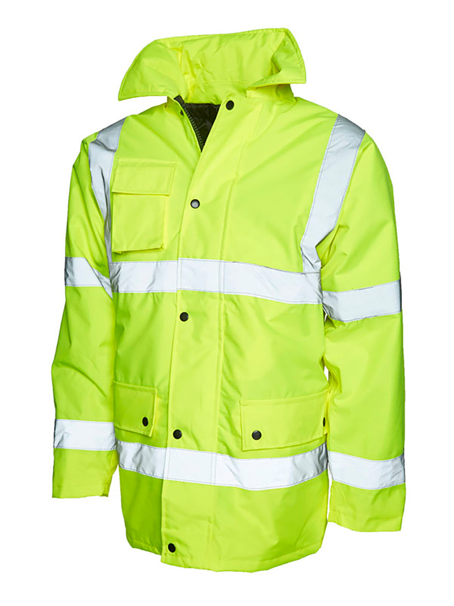 Uneek Clothing UC803 - Road Safety Jacket in yellow with two strips of reflective tape across chest and one over each shoulder and two strips on each arm, collar and full zip with flap and poppers. Pockets with flaps and poppers on right chest and two on lower front.